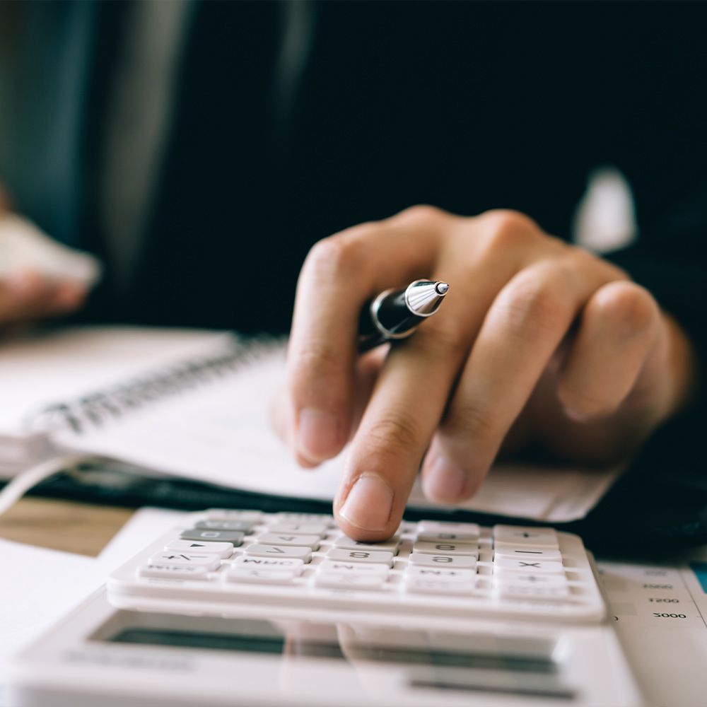 person using a calculator